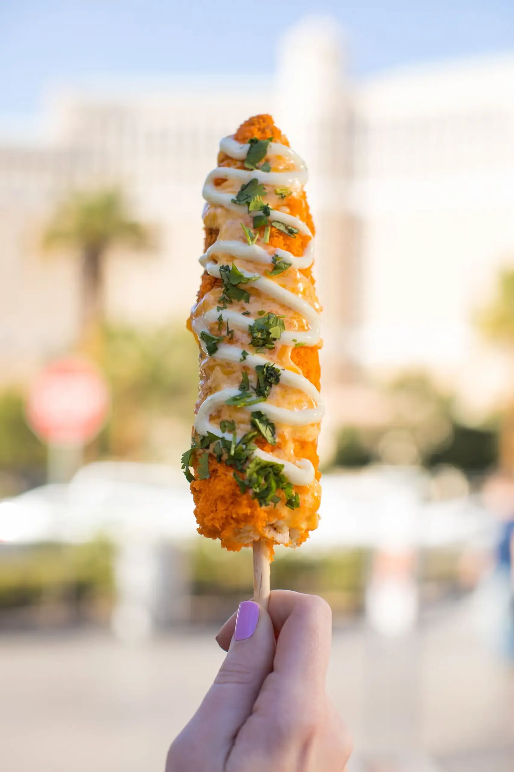 Las Vegas Dirty Dog Hot Cheetos spicy melted cheese puffs Mexican grilled corn butter lime mayo