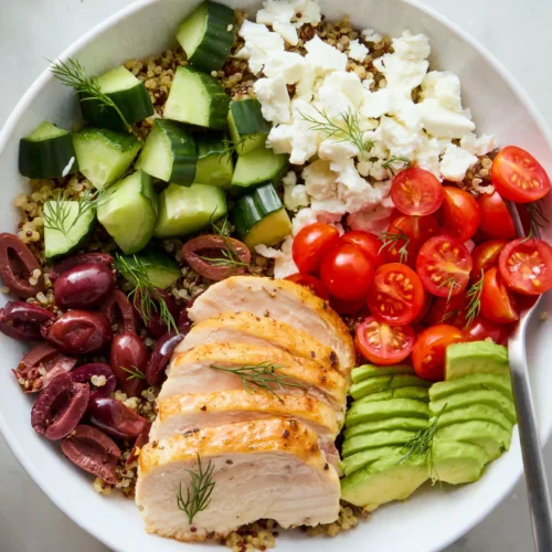 Greek power bowl veggies feta tomatoes chicken breast protein quinoa cucumber chickpeas