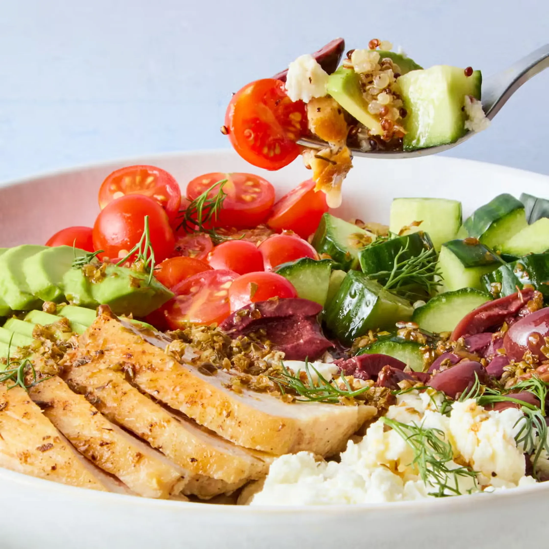 Greek power bowl veggies feta tomatoes chicken breast protein quinoa cucumber chickpeas