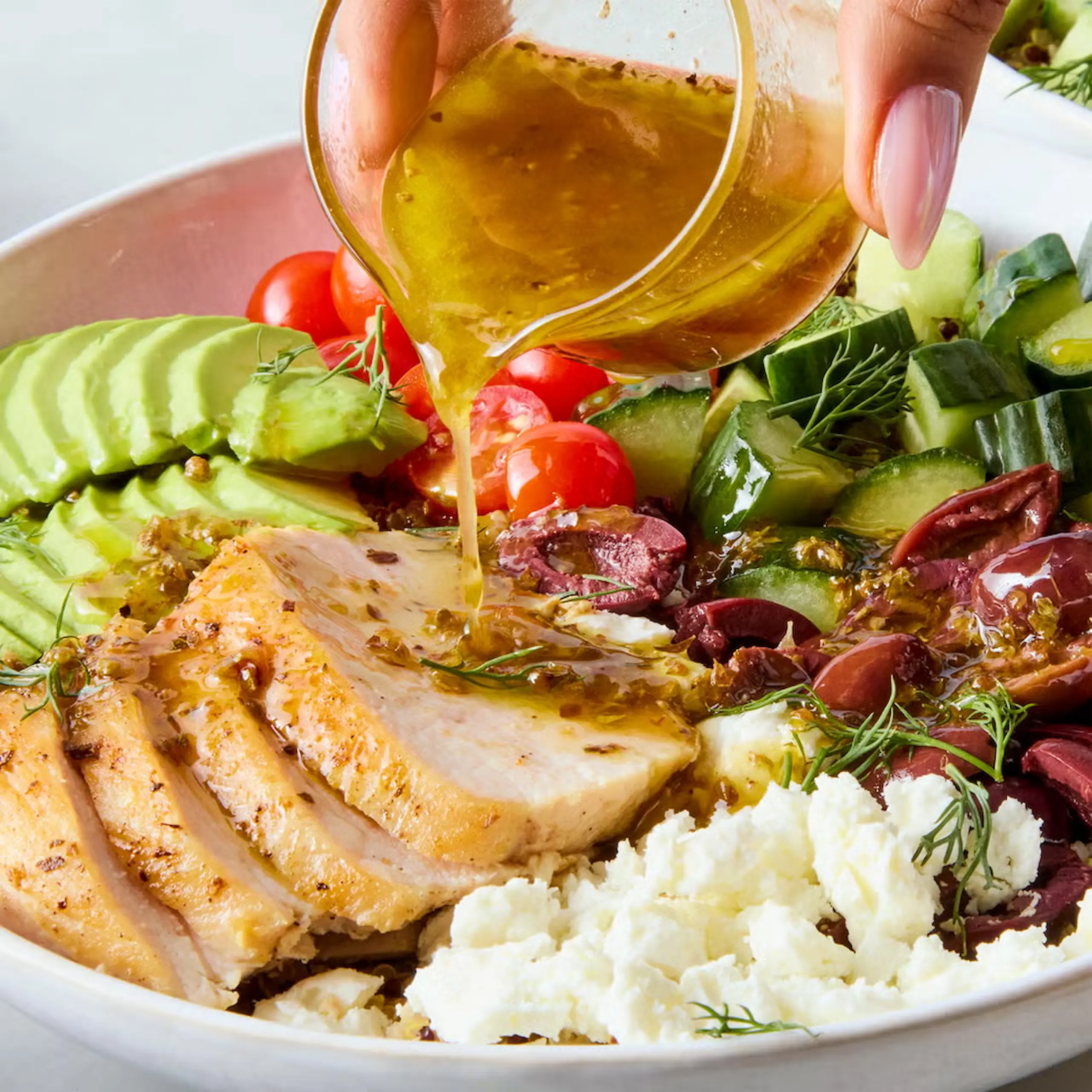 Greek power bowl veggies feta tomatoes chicken breast protein quinoa cucumber chickpeas
