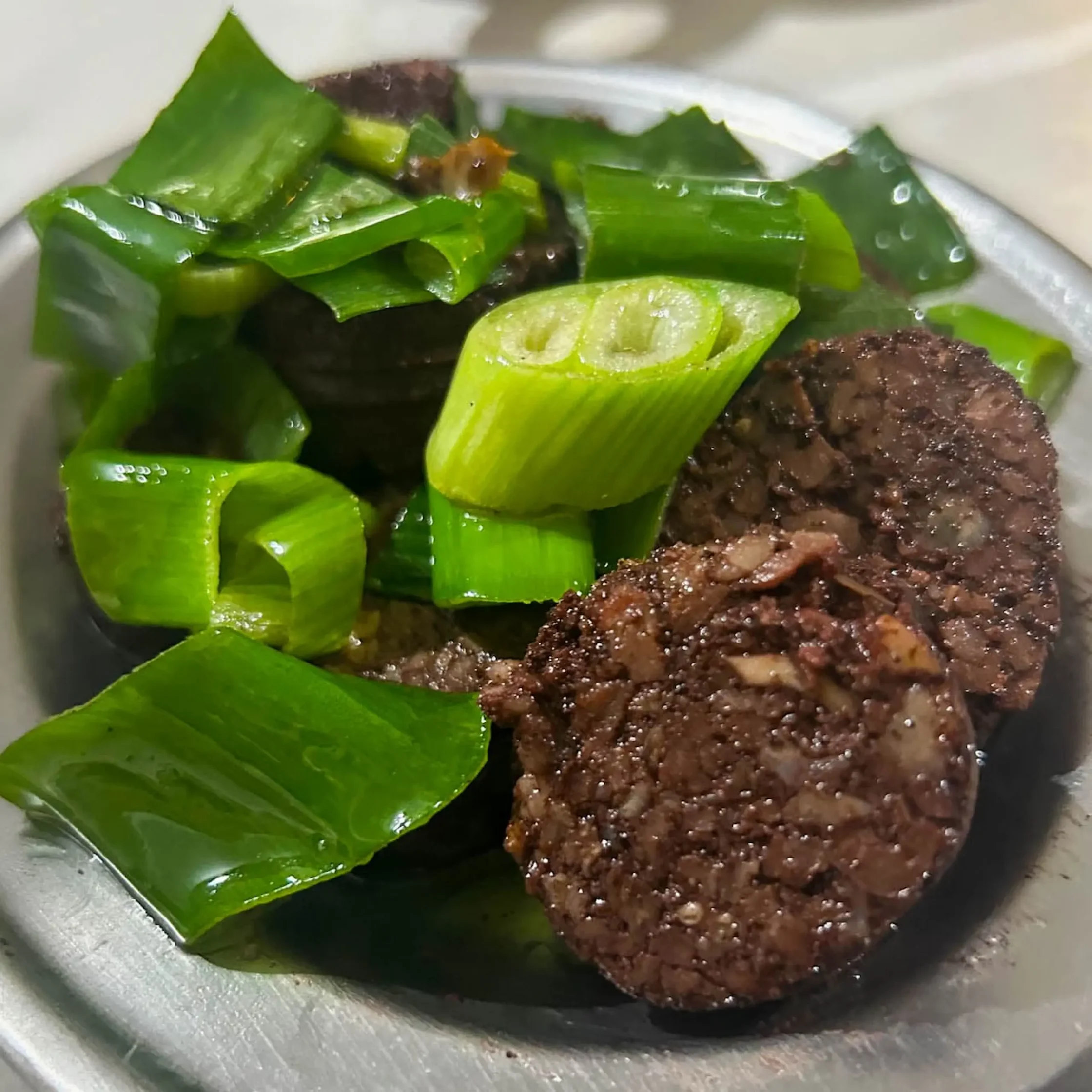 pinuneg with rice mixed with the blood
