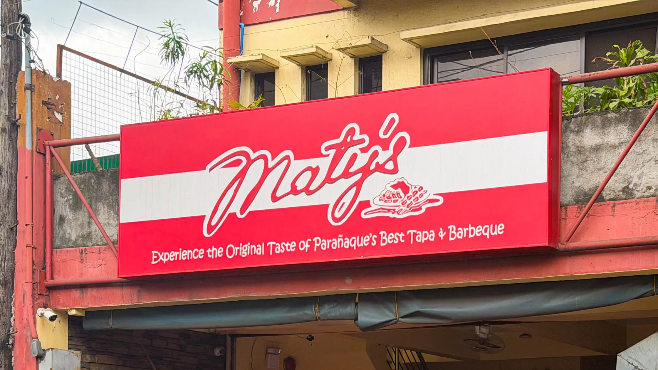 Maty’s Tapsilog and Barbecue storefront sign in Don Galo, Parañaque, featuring the restaurant name.