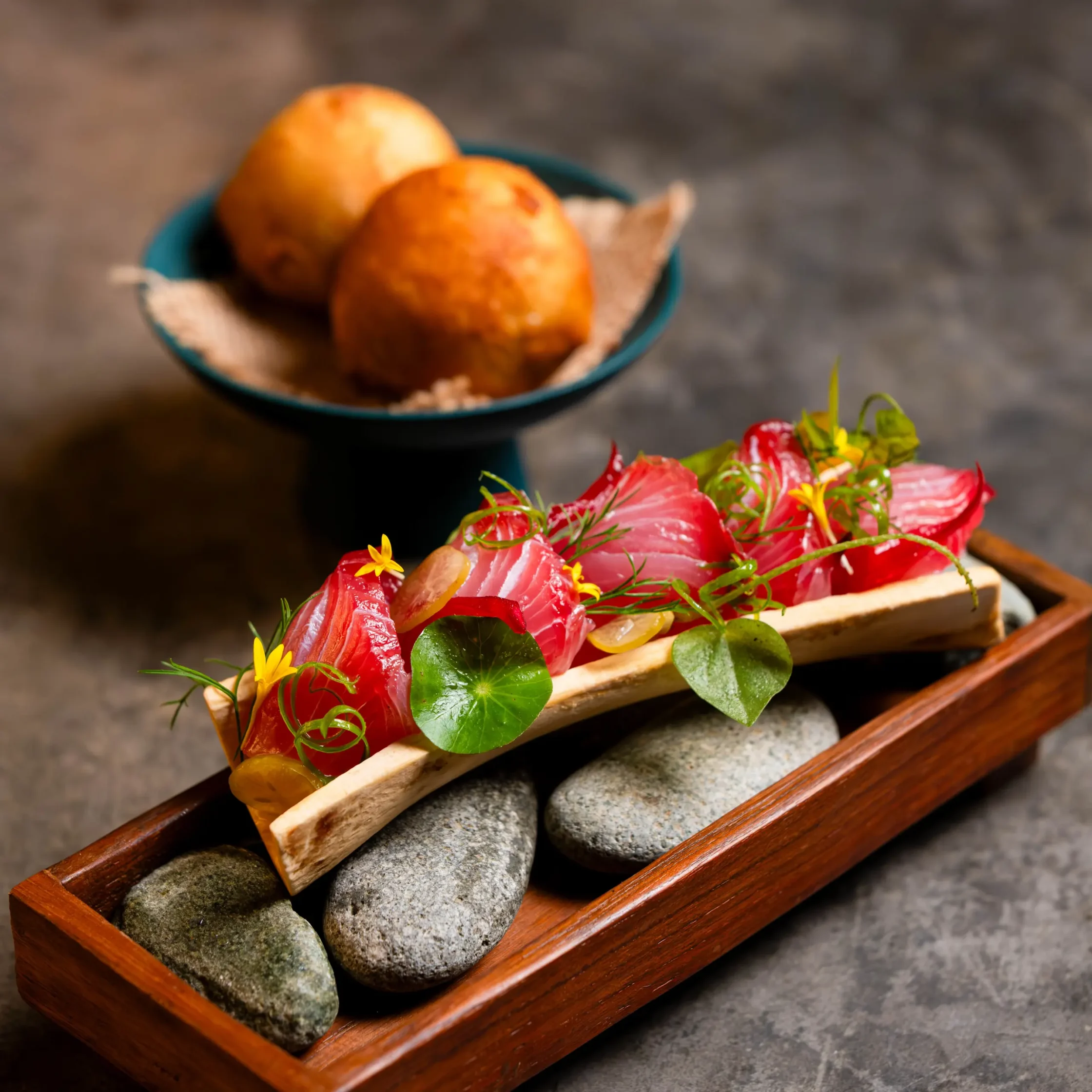 Roots' Smoked Carpaccio with swordfish, calamansi koshu, and wild herb