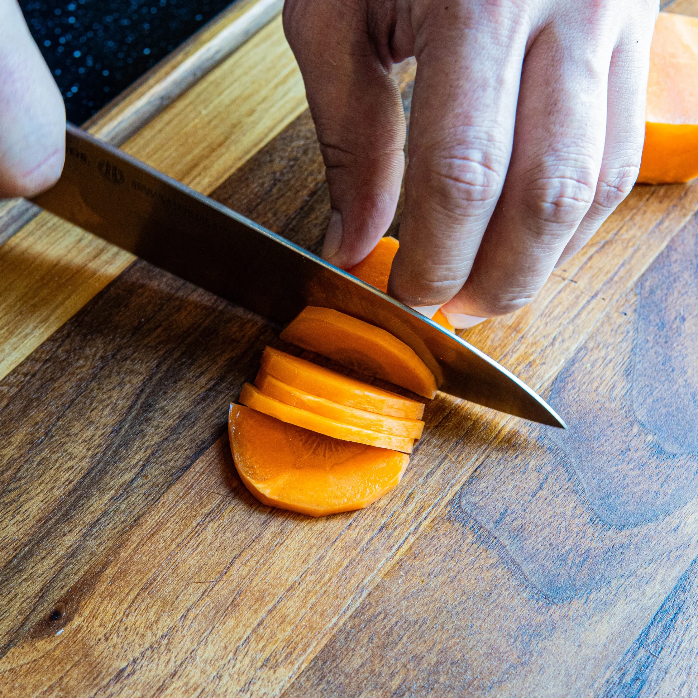 carrot sliced into half moons