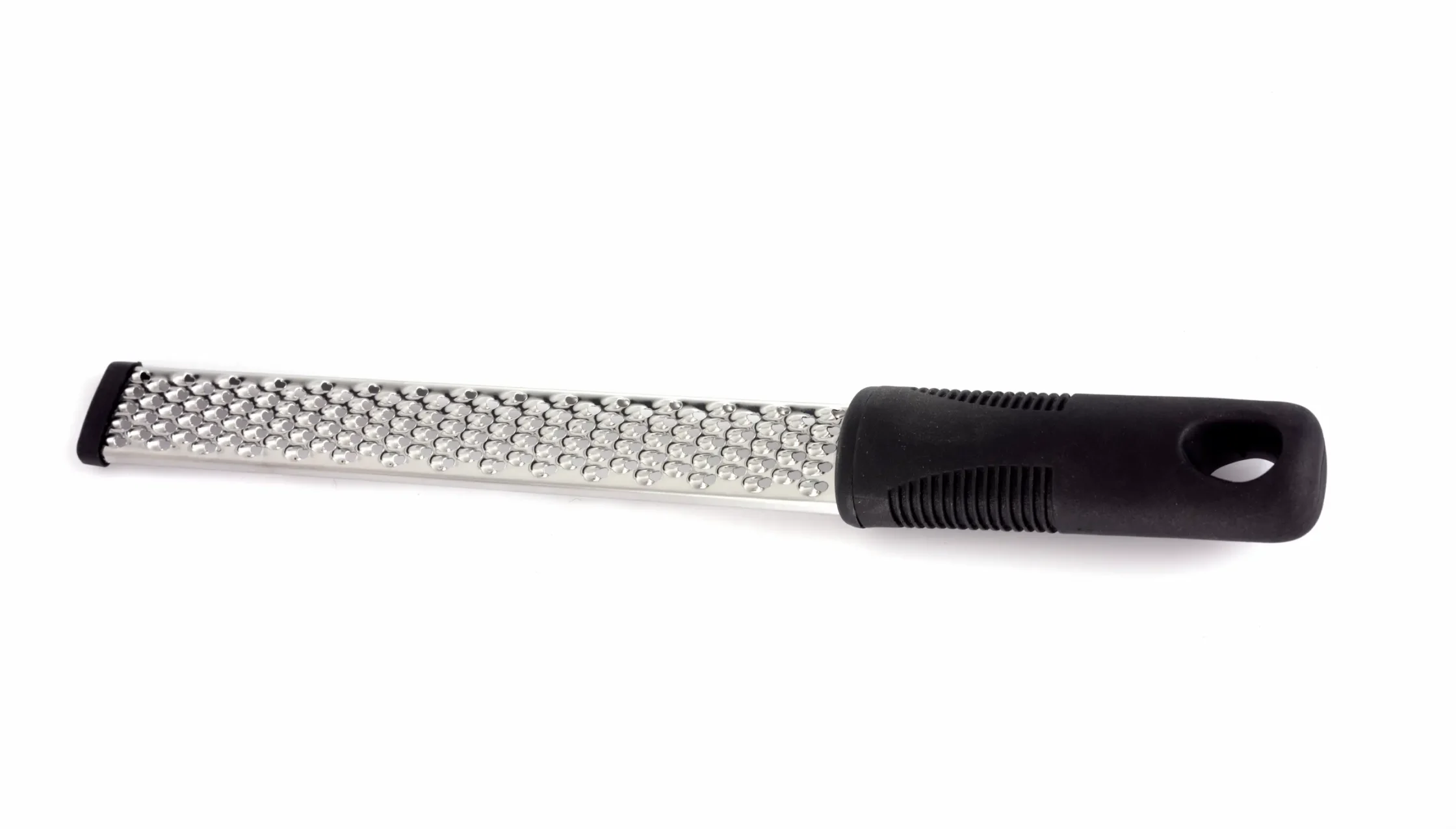 Microplane grater with a black handle shown on a white background.