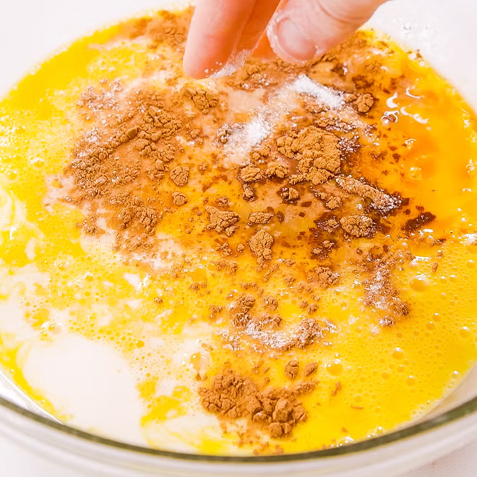 mixture of milk, cinnamon, eggs, sugar, vanilla, and salt for french toast