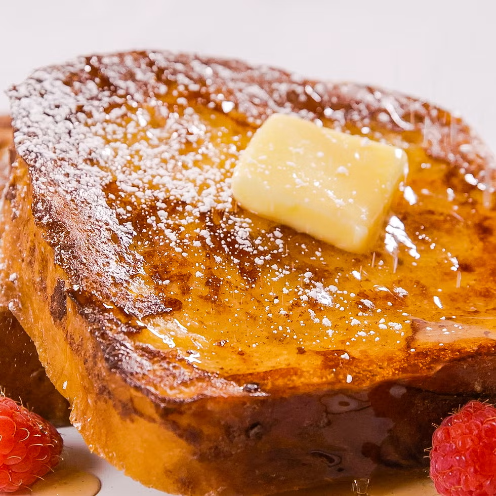 french toast with maple syrup and butter