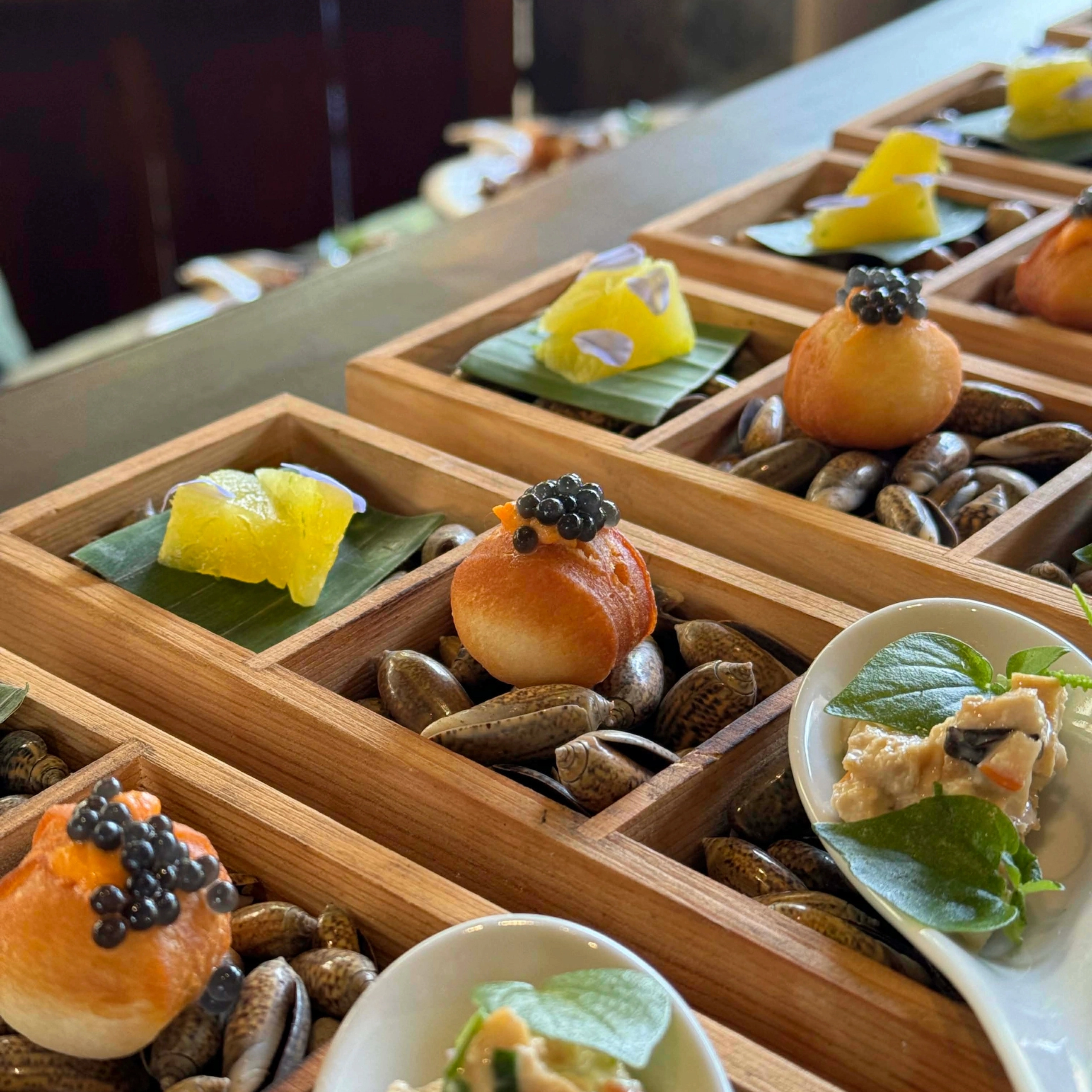 Compressed Sauma Pineapple with Dalandan, Cadiz Aligue Munchkin with Mulberry Vinegar Beads, Smoked Tanguigue Tarts with Batuan Mayo