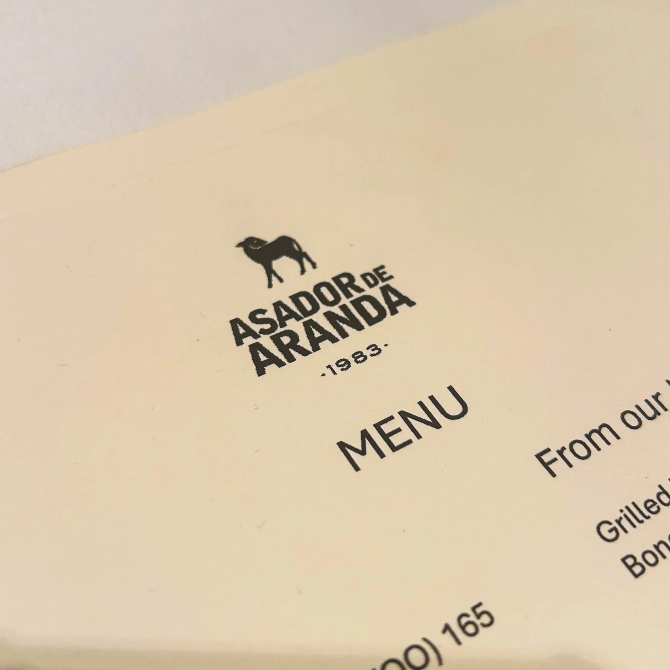 Asador de Aranda Manila menu showcasing authentic Spanish restaurant branding and traditional cuisine