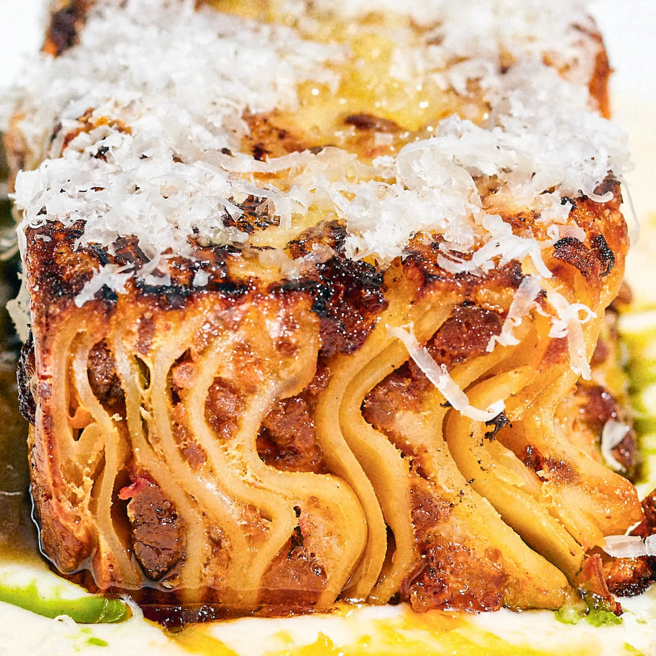 Osteria's cheesy lasagna with braised bee