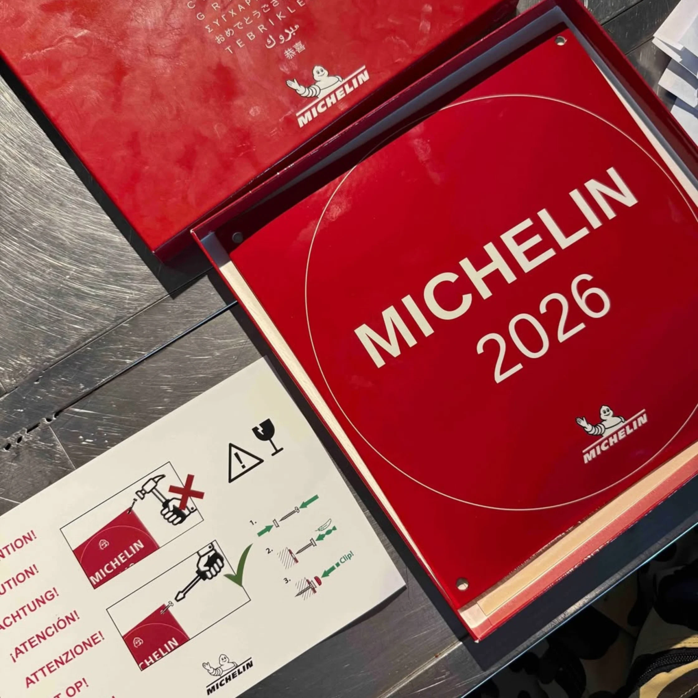 Michelin Guide 2026 signage and branding display for NowNow restaurant selection announcement, modern culinary industry recognition photo