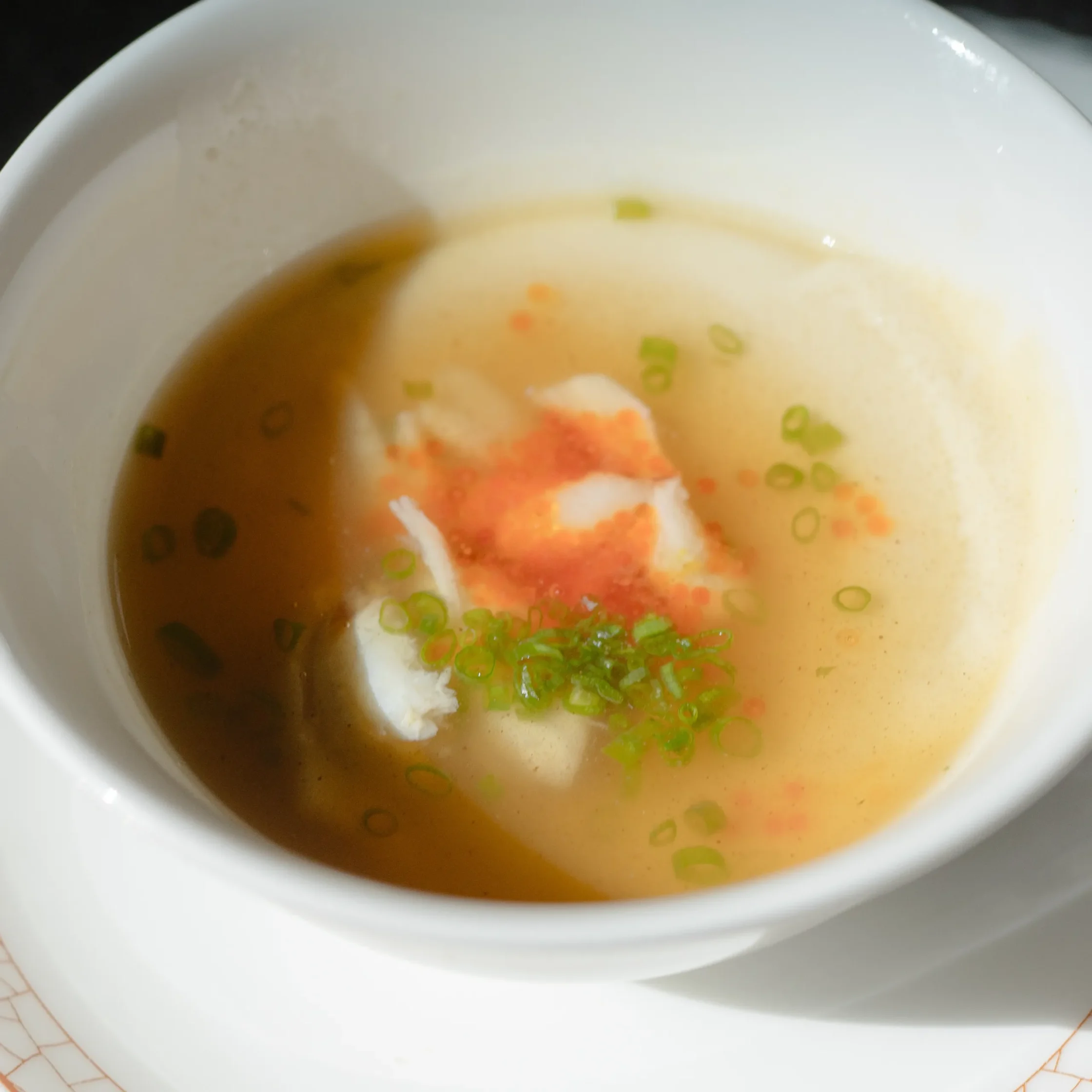 Ginat-an custard from Chef Frances Tariga's Tadhana menu at the Mega Ball, featuring delicate seafood flavors and rich broth.