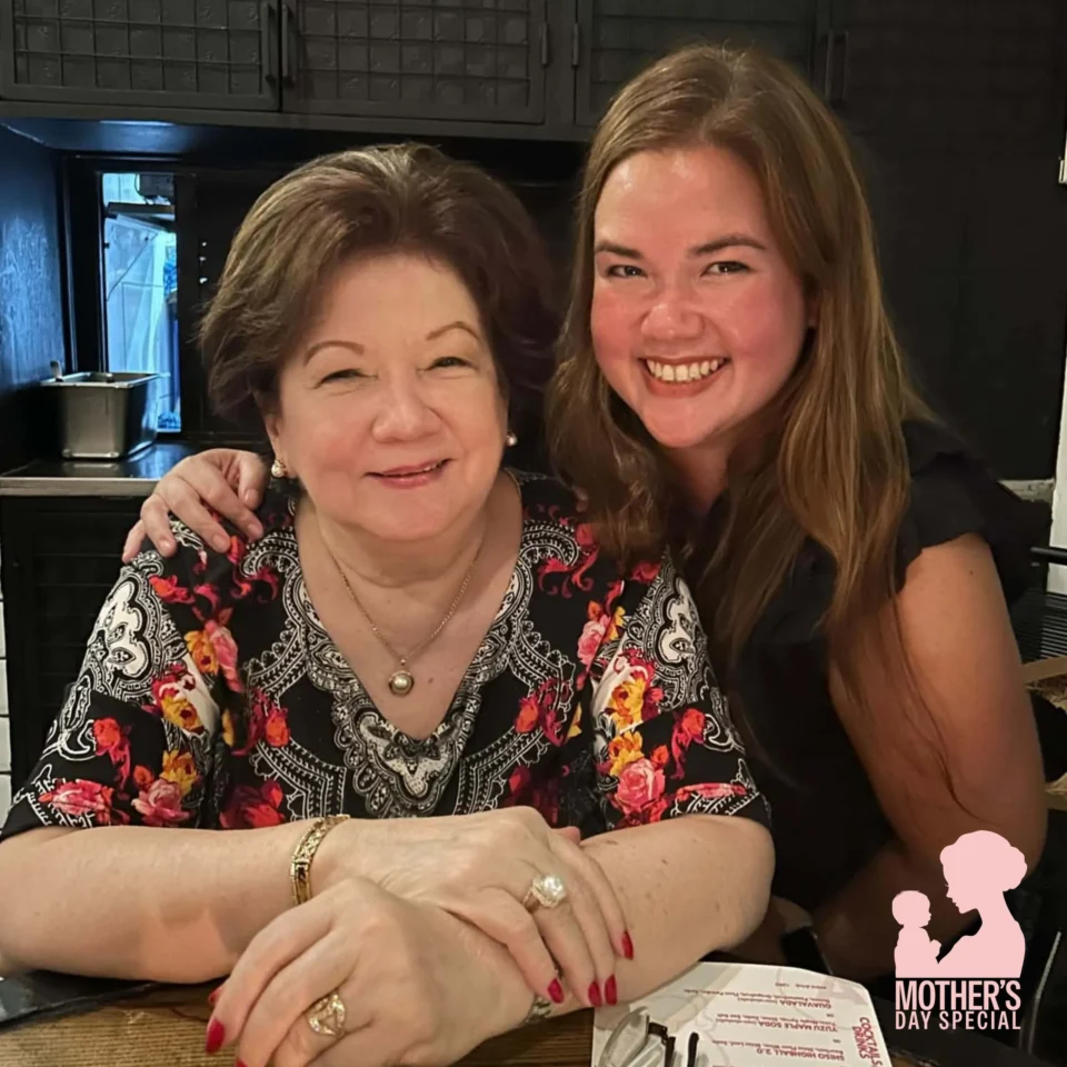 Portrait of Tina Legarda and her mom, Bettina Legarda, smiling together indoors.