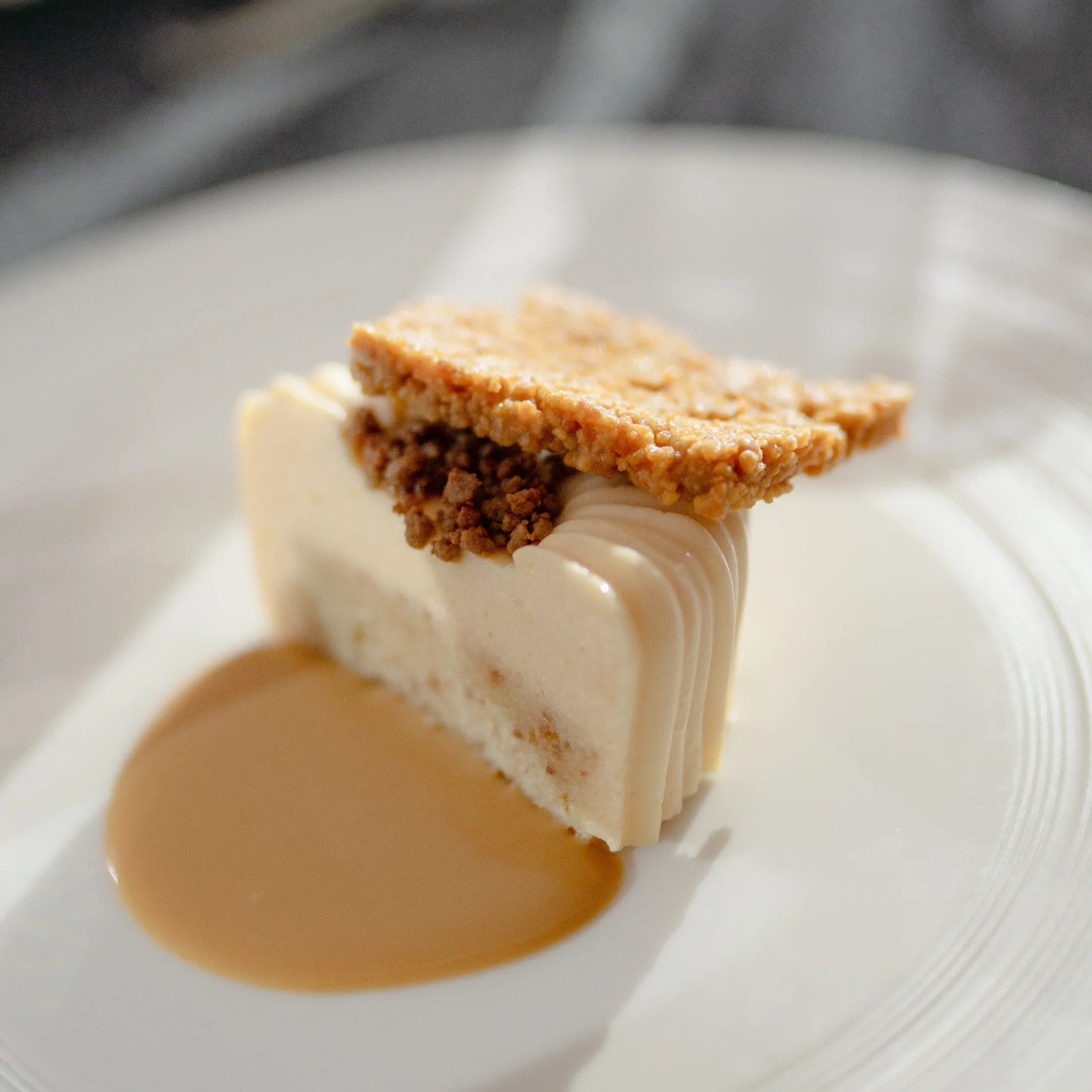 Maja Blanca from Chef Frances Tariga's Tadhana menu at the Mega Ball, paired with a smooth caramel sauce and crisp topping.