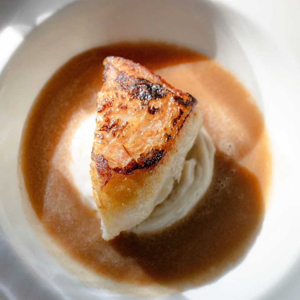 Sinigang sa Bayabas from Chef Frances Tariga's Tadhana menu at the Mega Ball, served with a velvety sauce for an elegant finish.