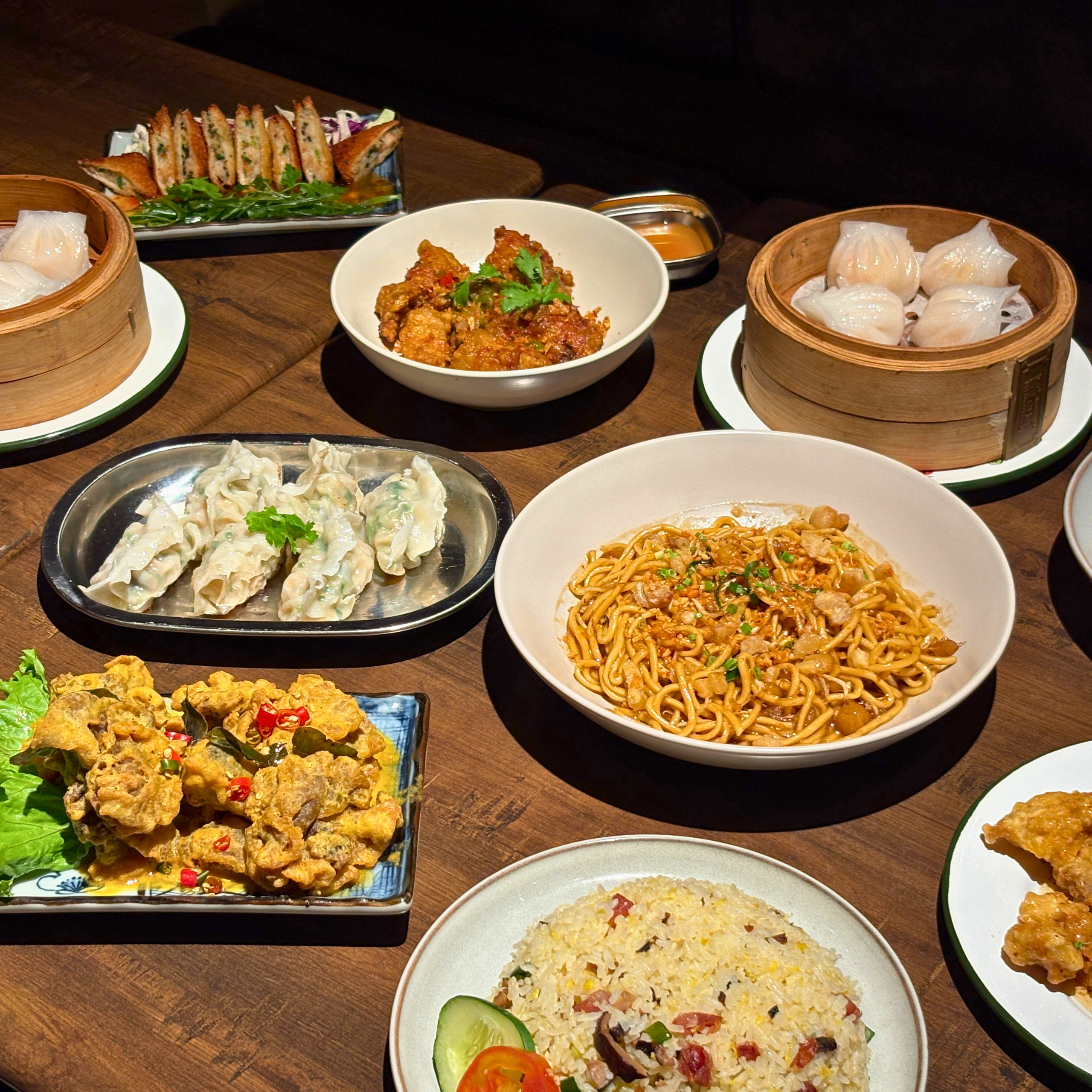 wong place capital commons pasig spread with dimsum noodles pork chicken and chinese food
