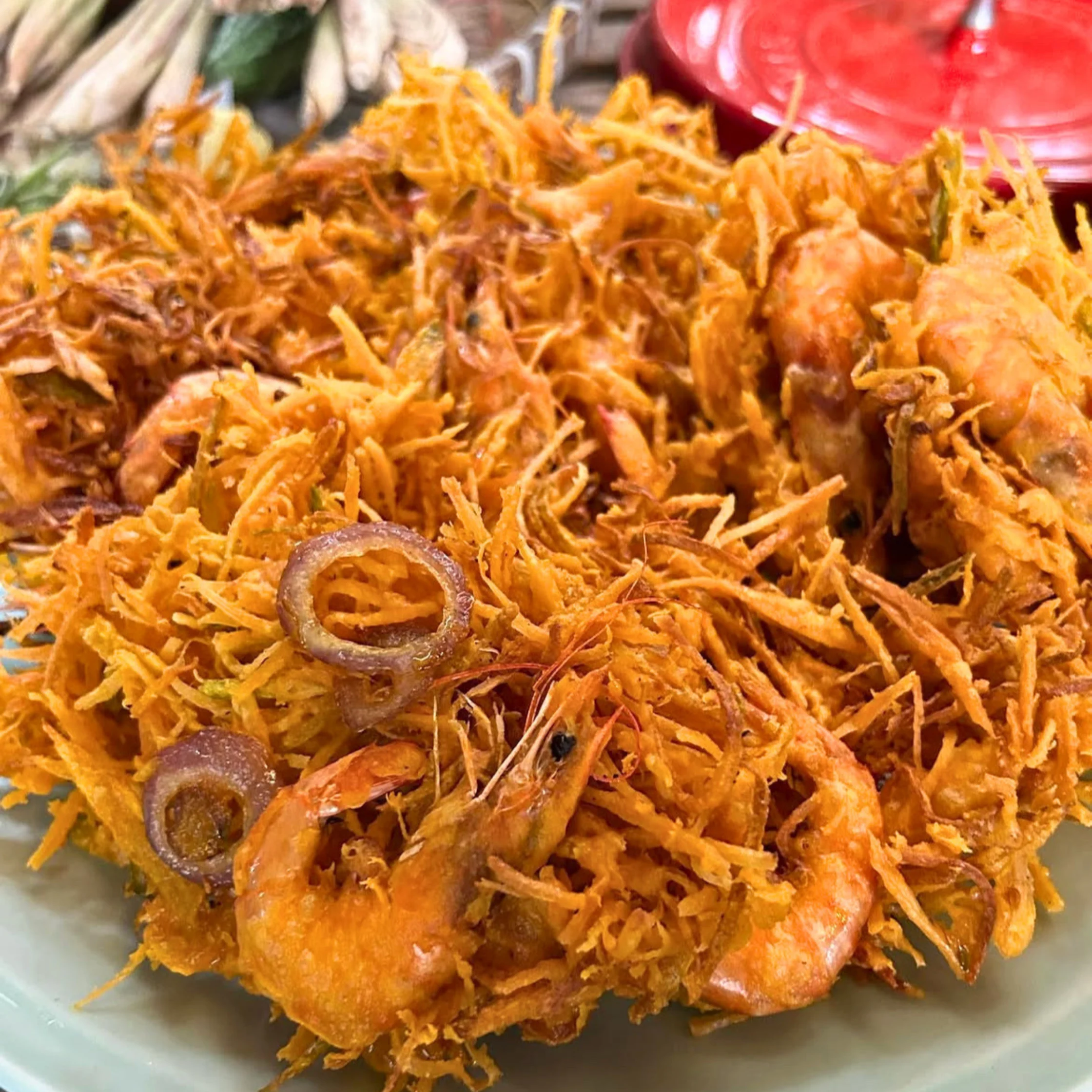 Pritong Hibe (crispy freshwater shrimp) mixed with shredded vegetables and aromatics. The abundance of tiny shrimp and crisp strands suggests a crunchy Kapampangan seafood dish.