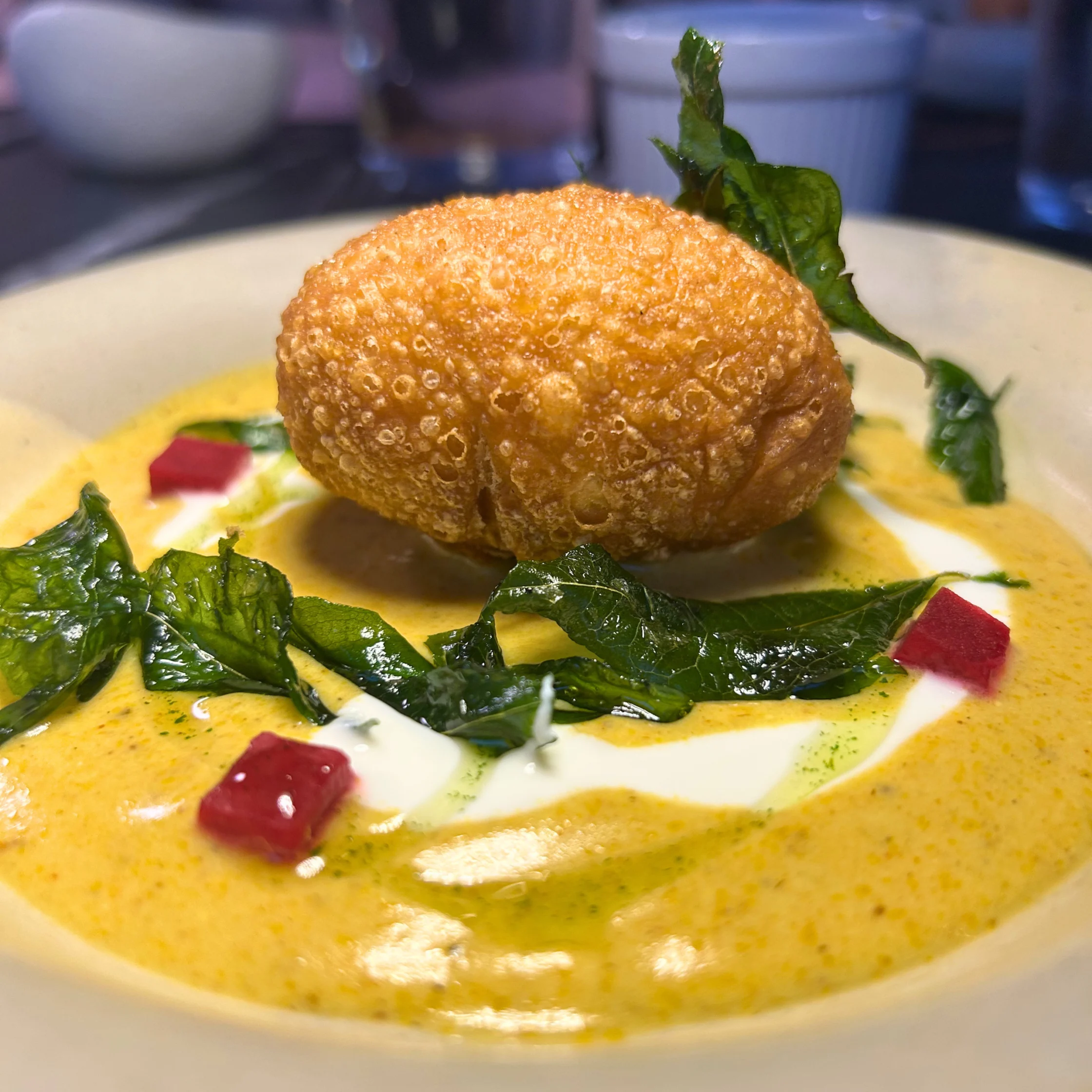 Chicken kachori is a popular, savory deep-fried pastry filled with spiced minced or shredded chicken. It features a crispy, flaky outer crust and a flavorful, tender interior, and is usually served hot with mint chutney, ketchup, or sweet tamarind sauce.