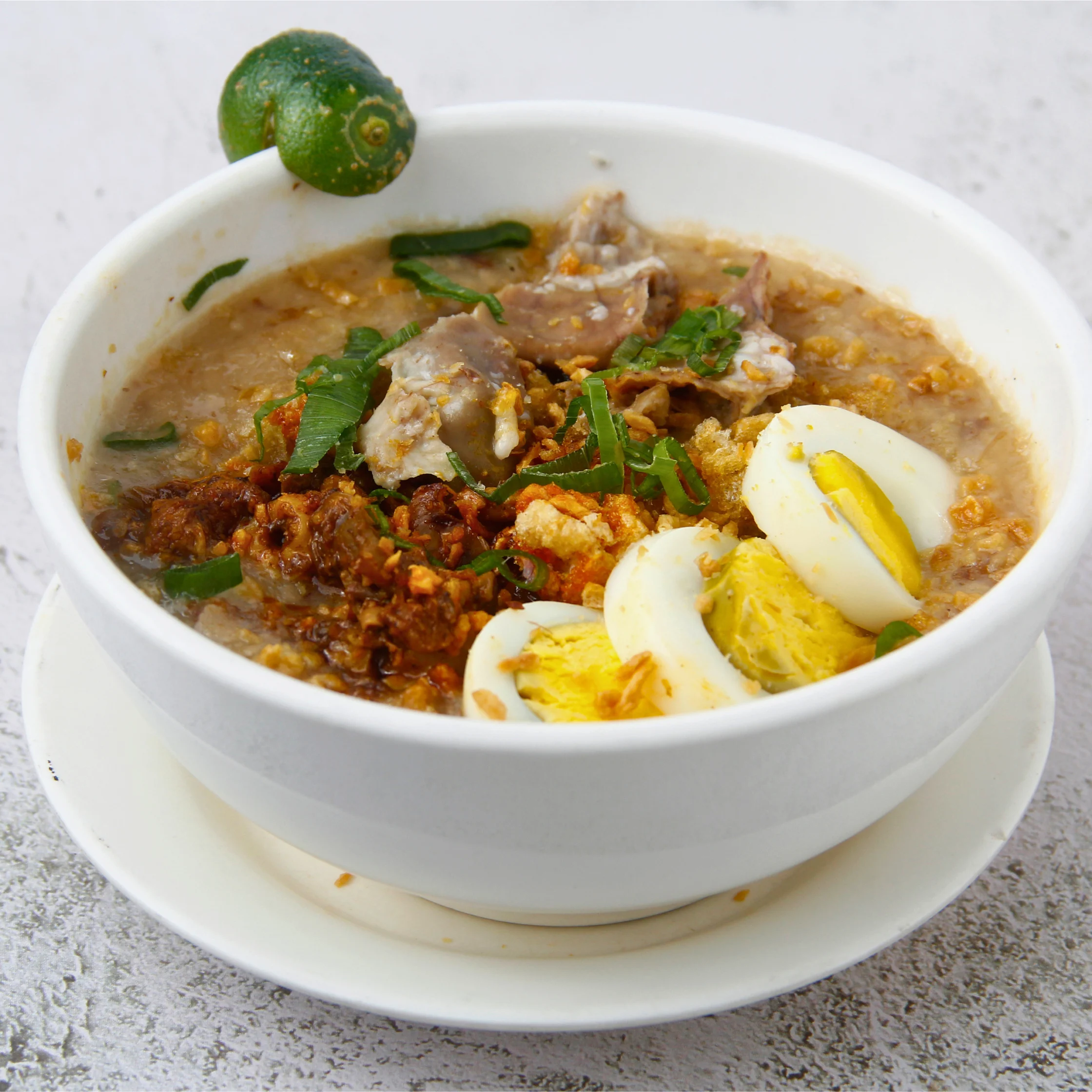 lugaw topped with crispy garlic bits