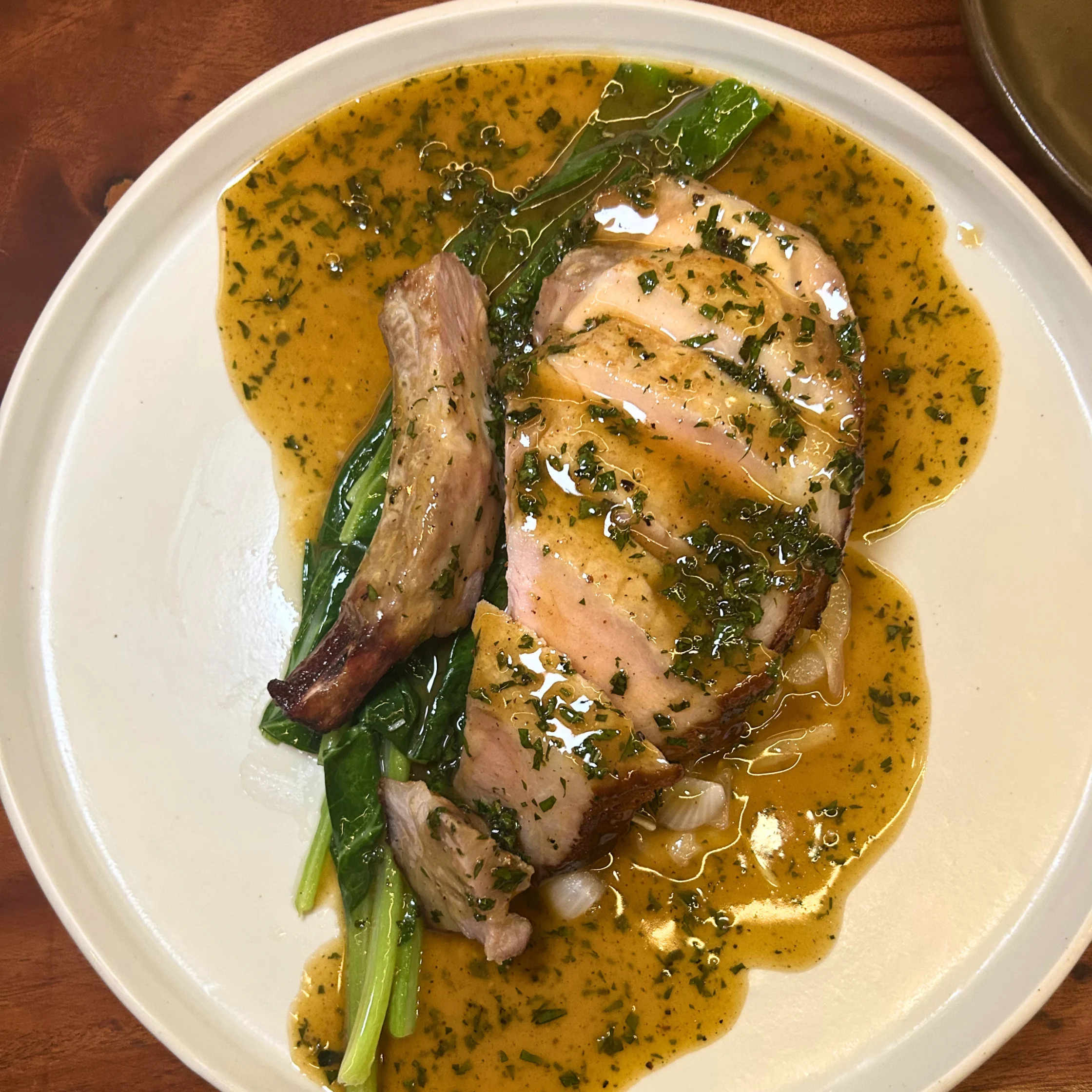 metiz new menu dry aged pork chop asado sauce by Stephan Duhesme