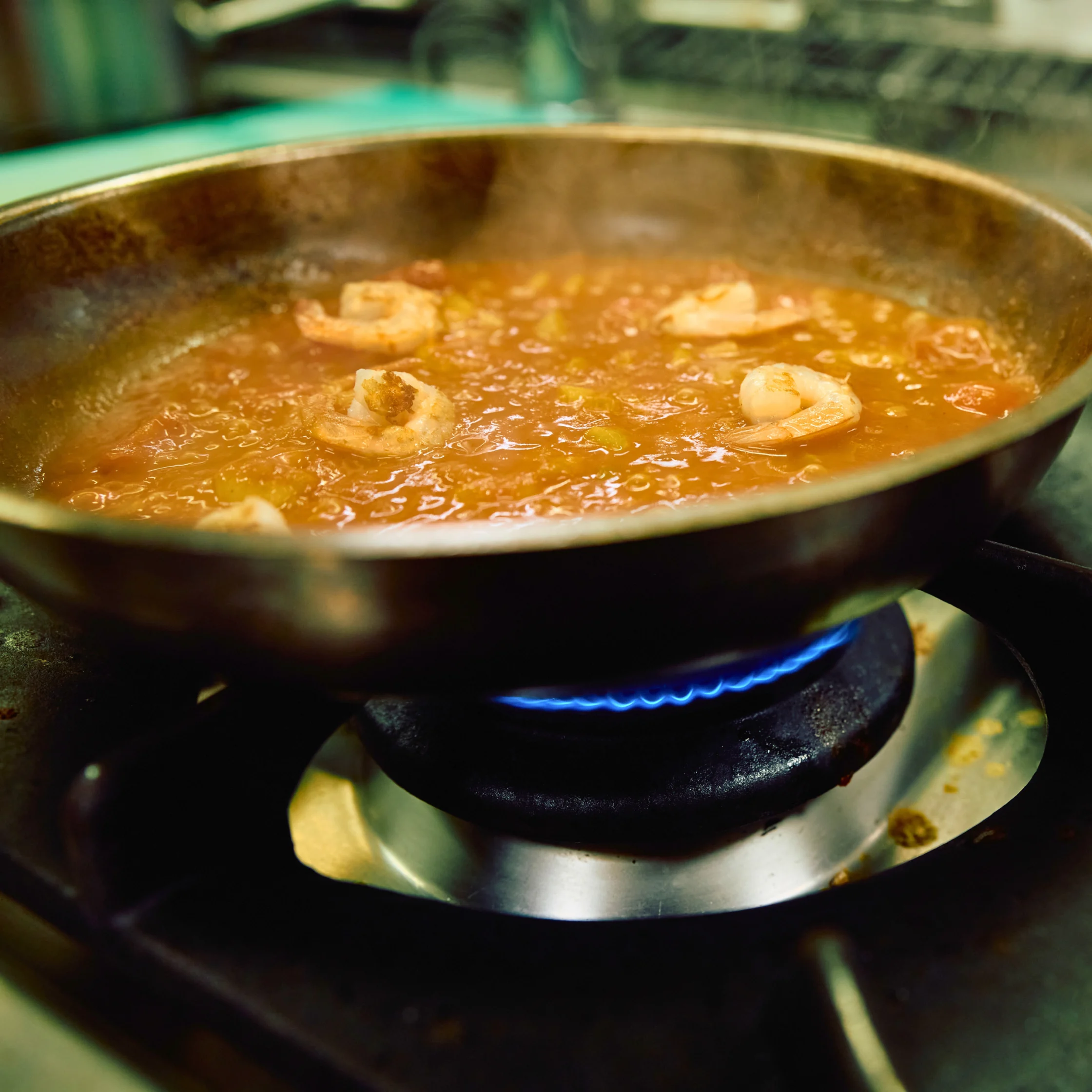 sauce simmering without lid on low fire to get thciker