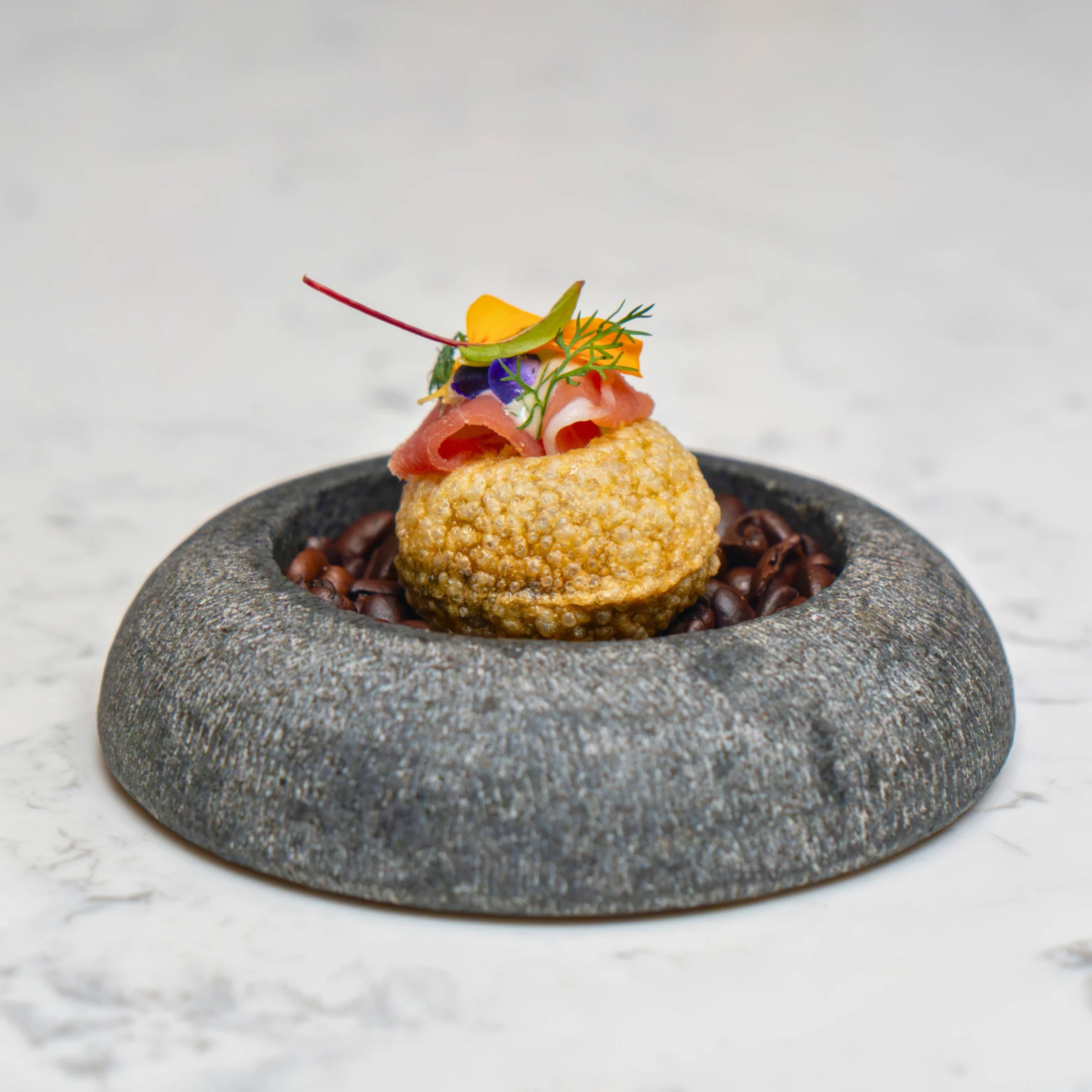First Course - Harvest puri shell cocoa espuma grated Batangas cacao nibs and cured ham