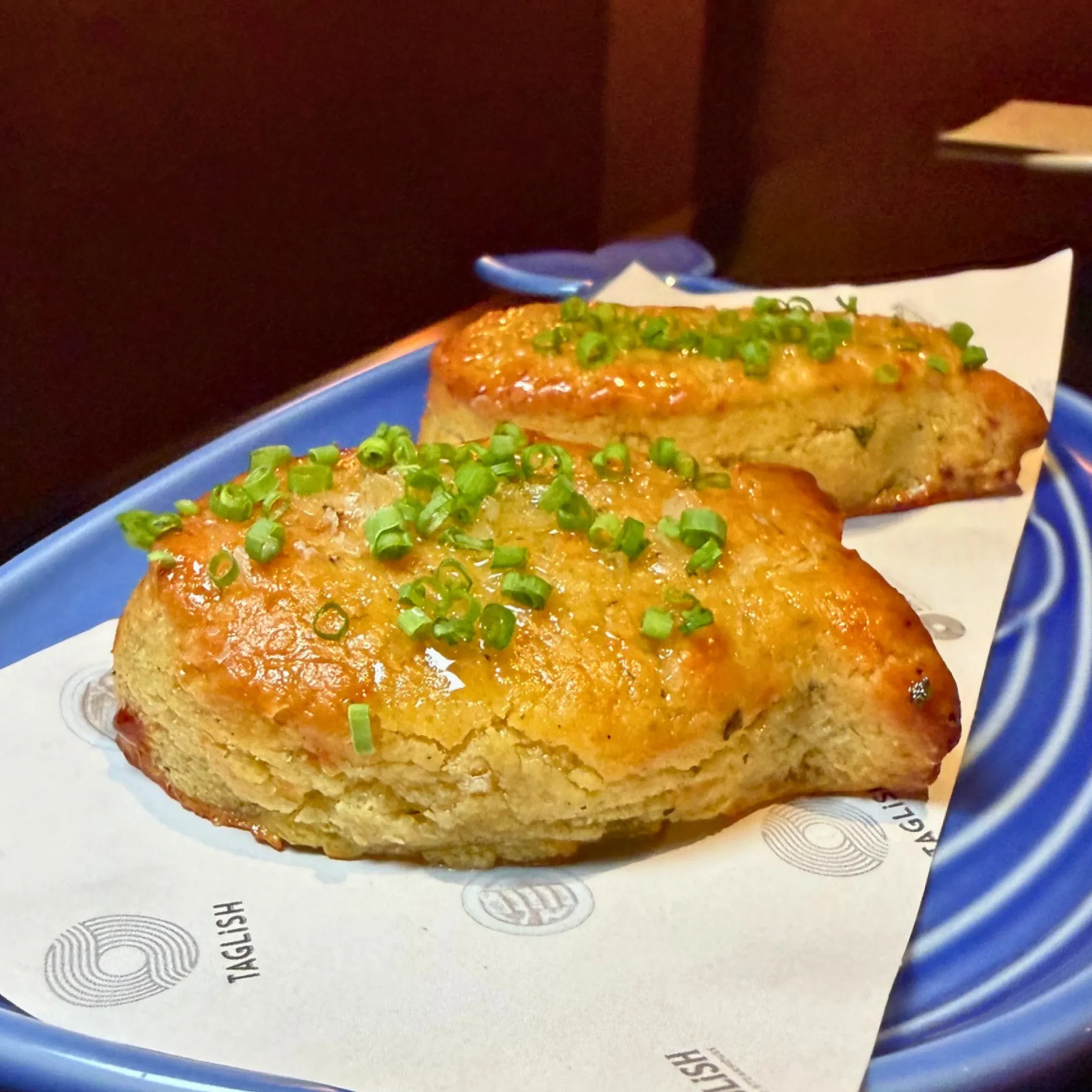 Goldfish Cheddar Biscuit on plate with chives