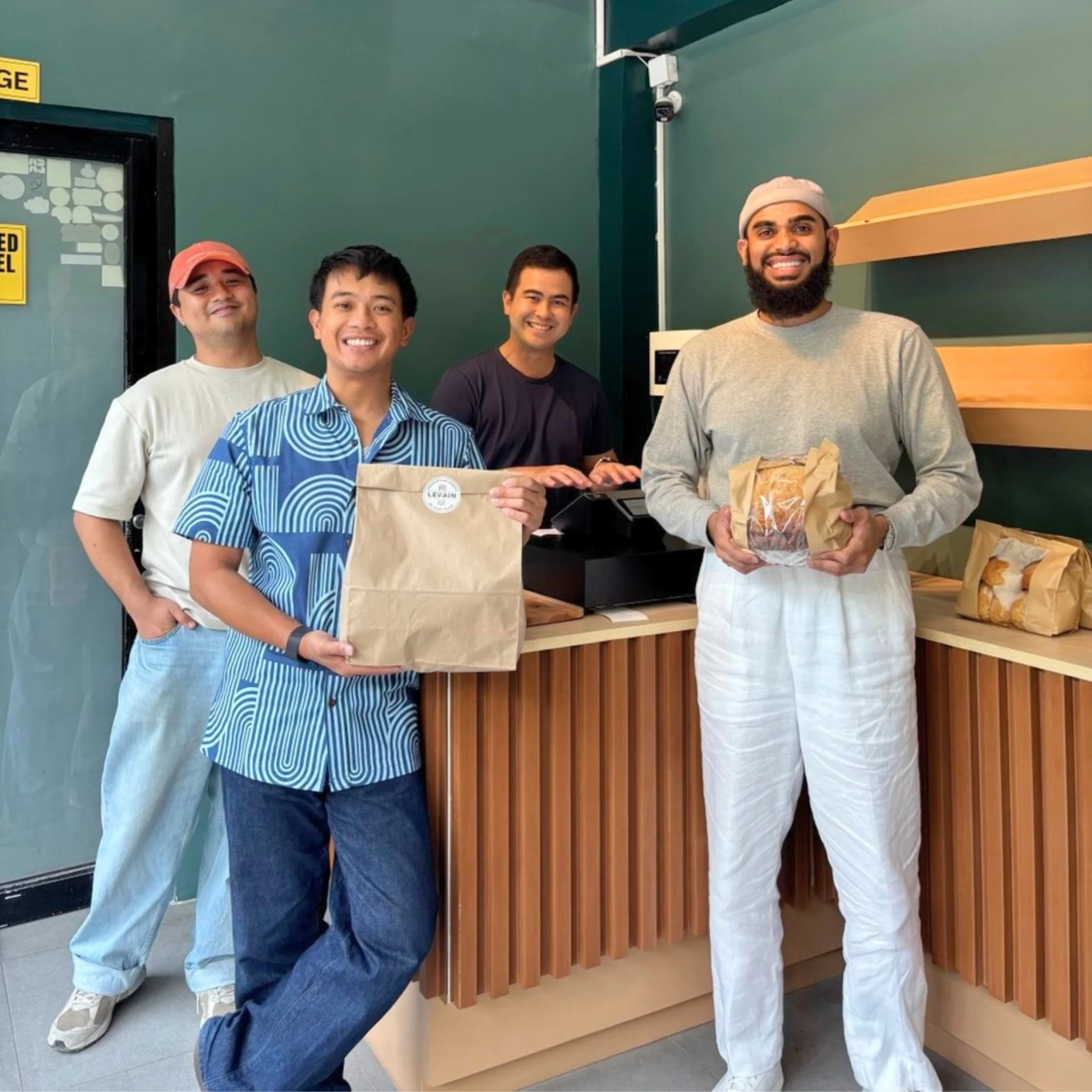 Mabu team members with staff from Levain Commissary, one of the local bakery partners offering surplus food through the platform.