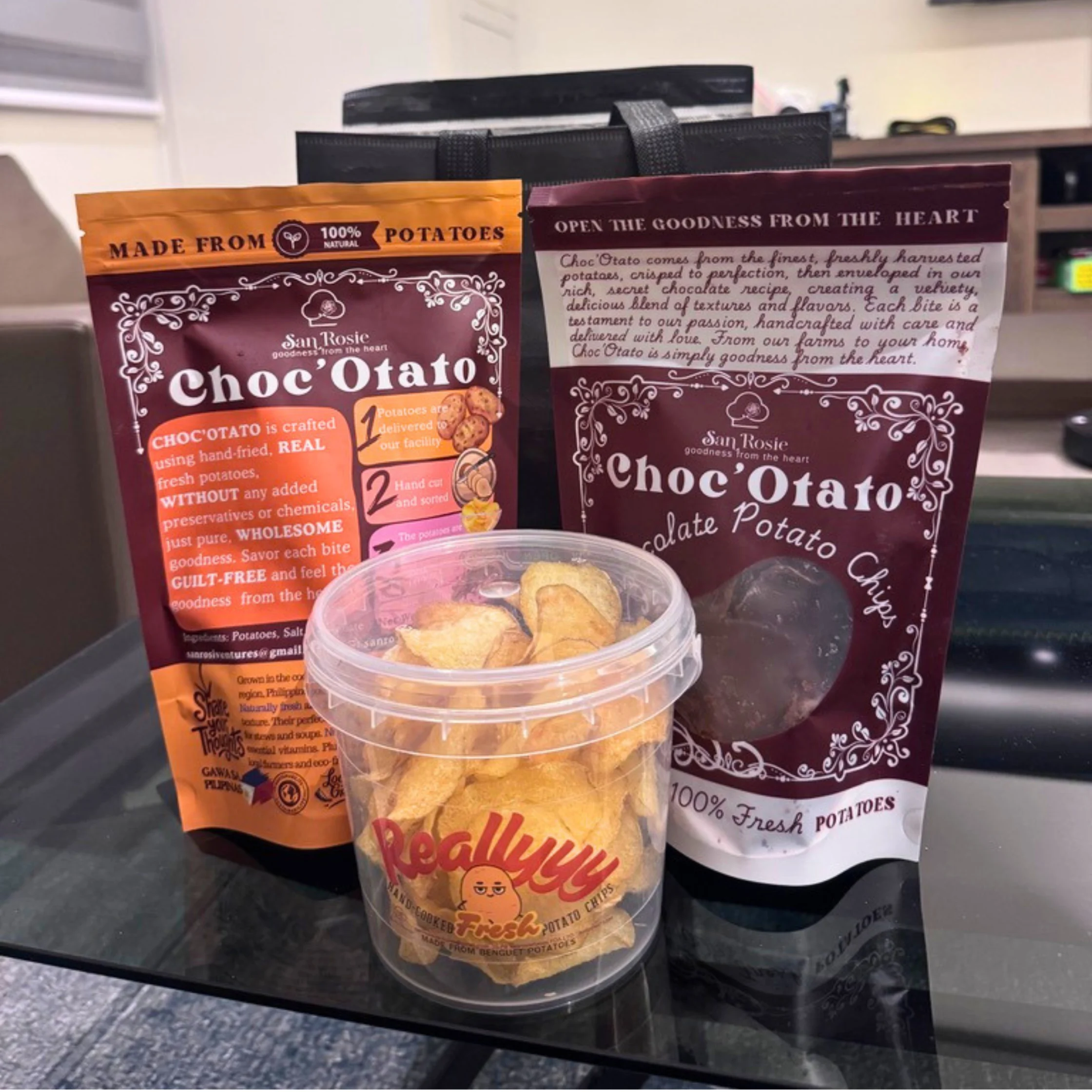 Surplus snacks available through Mabu, including San Rosie Choc'Otato chocolate potato chips and Reallyyy potato chips offered at discounted prices.