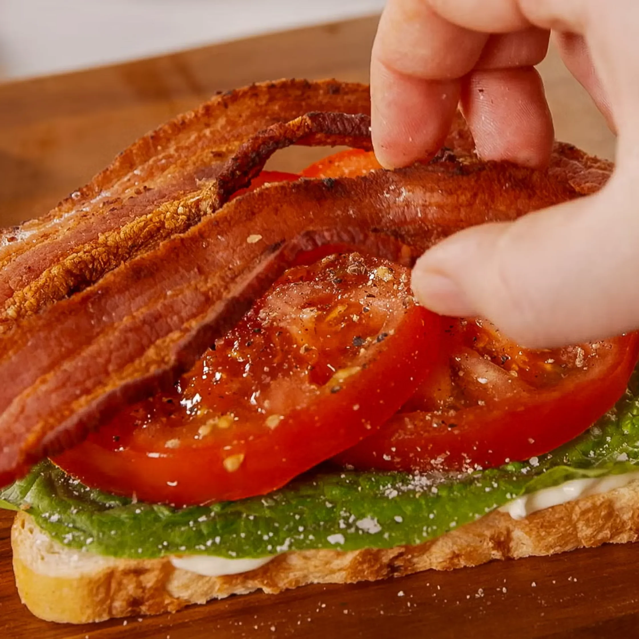 Top with the cooked bacon.