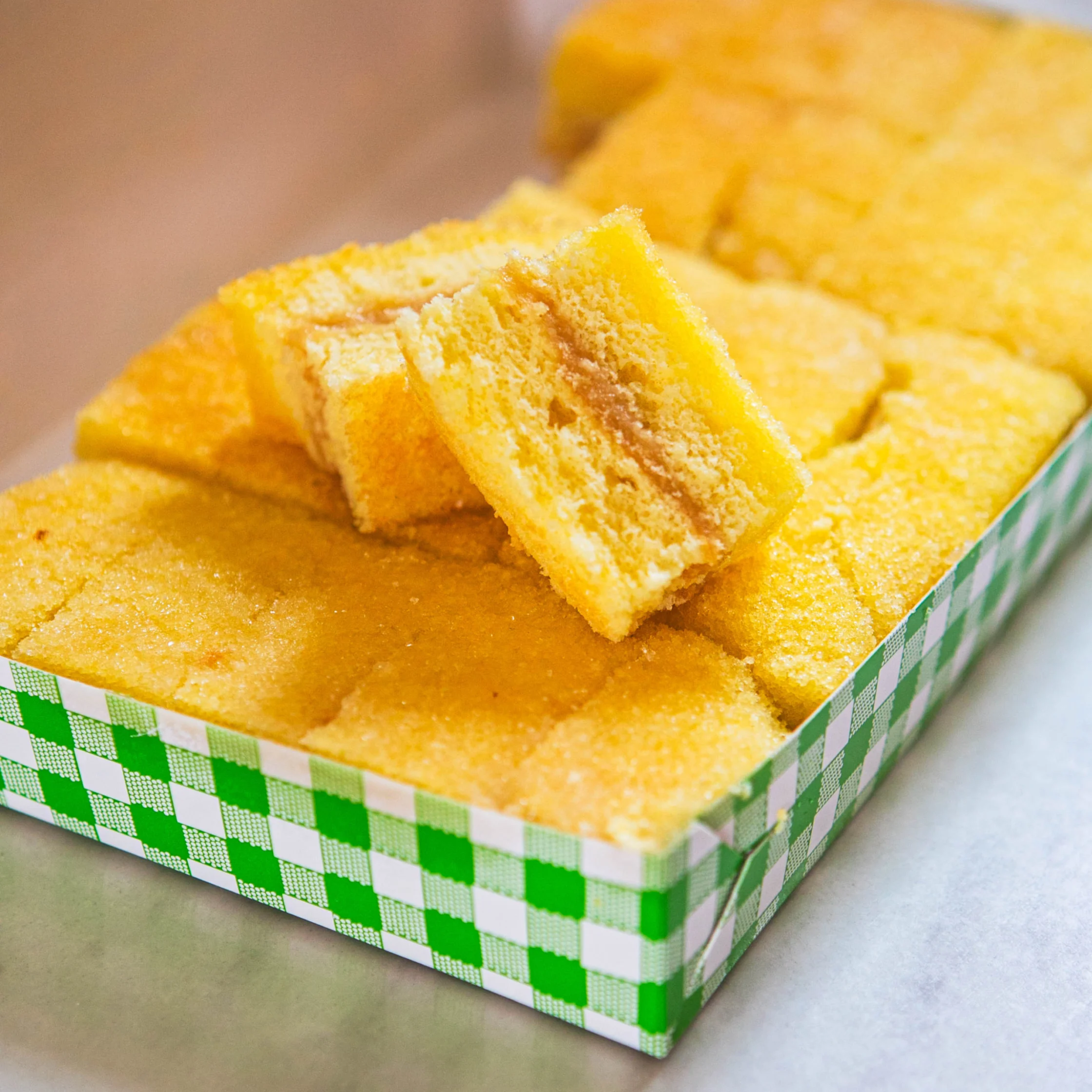 inipit, two slices of light sponge cake filled with a luscious custard.