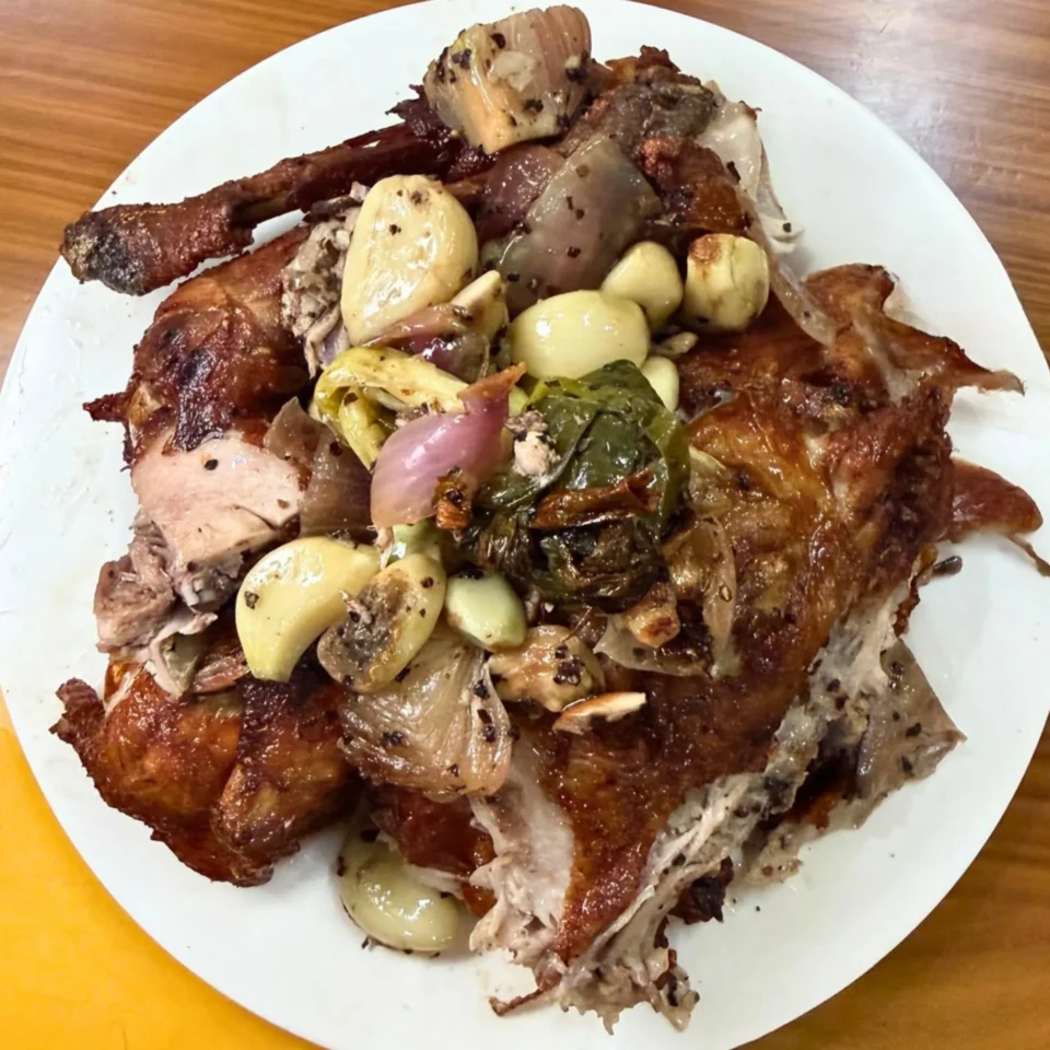 native fried chicken topped with aromatics from six sisters in bohol