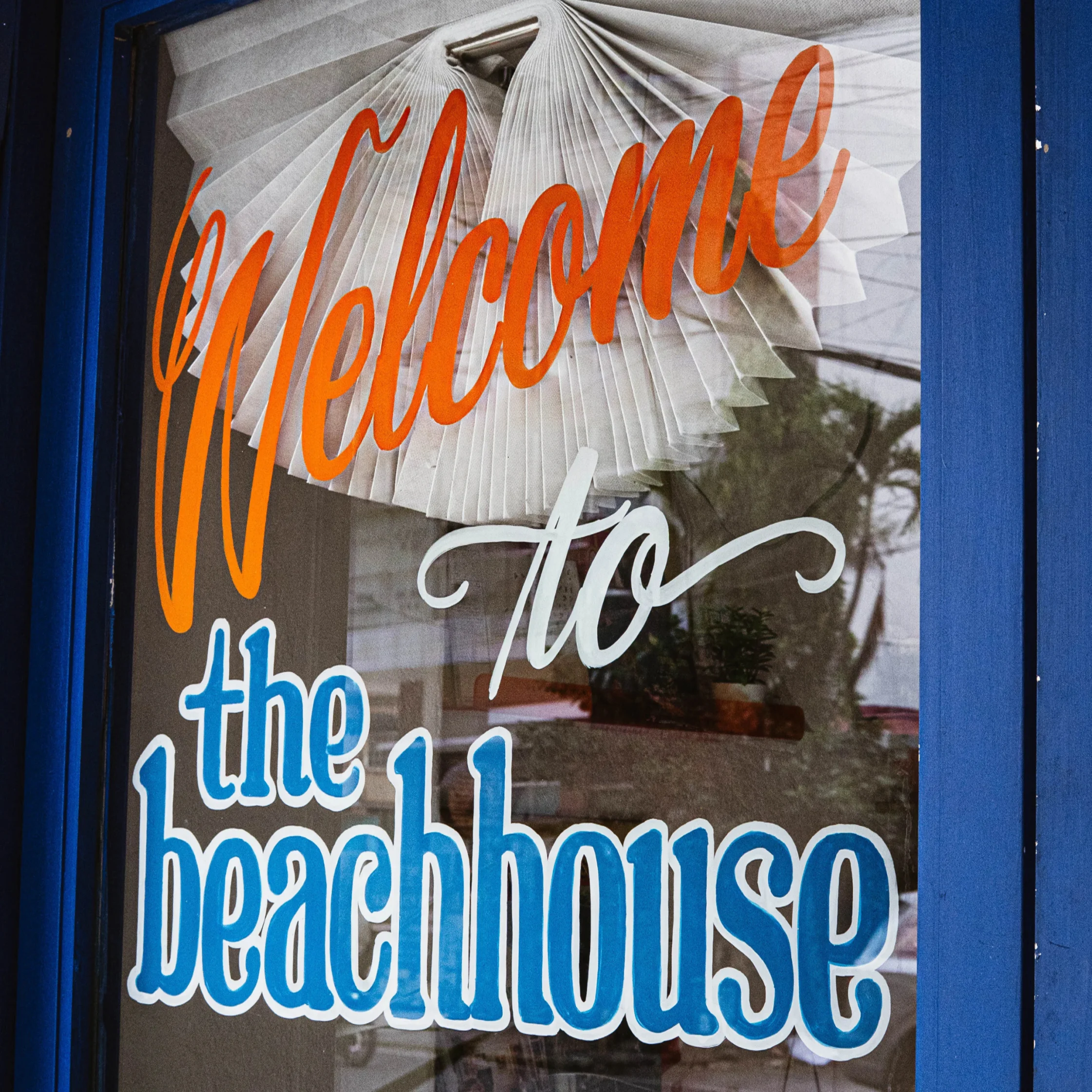 the beachhouse kapitolyo cafe door sign