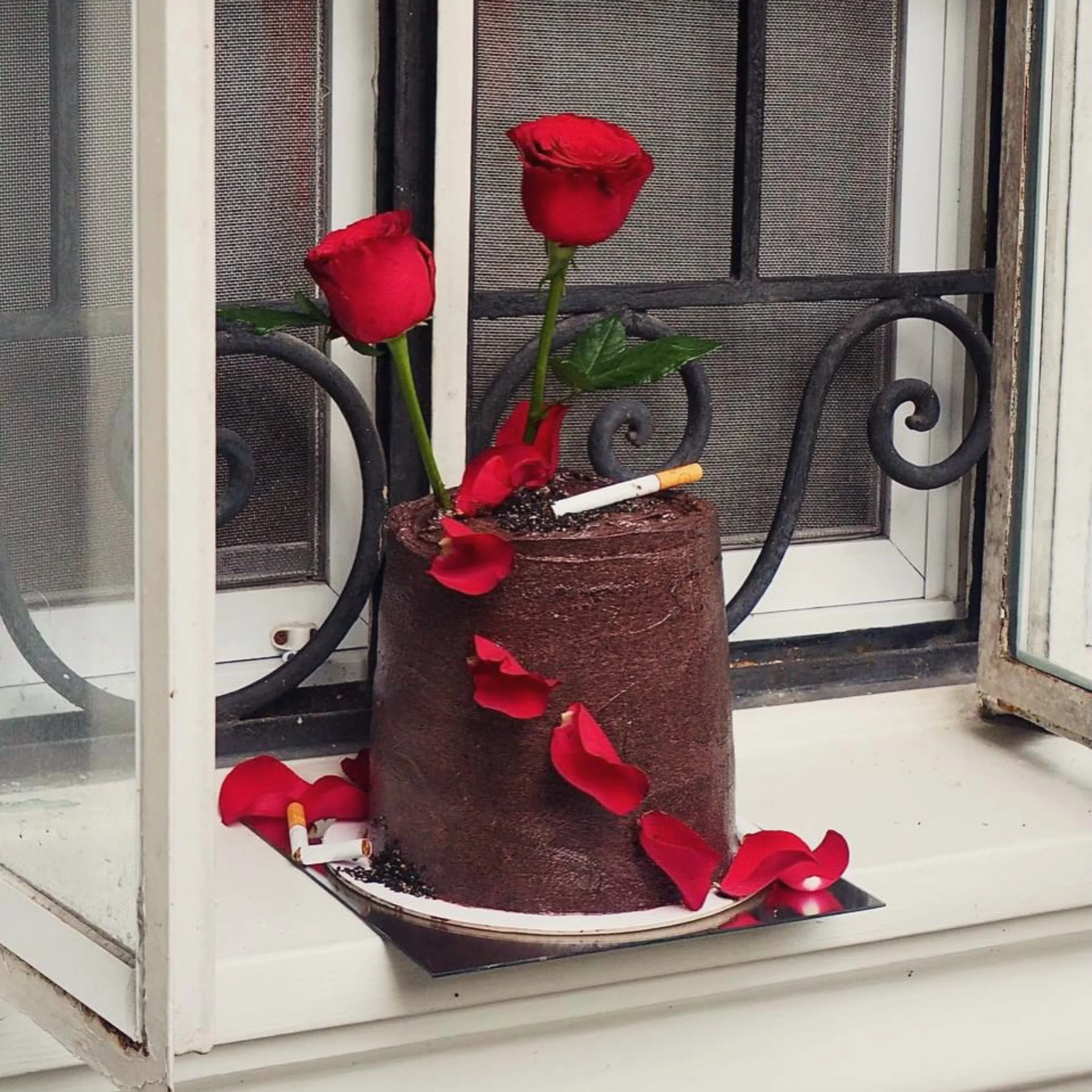 Chocolate Cake with Roses and a Cigarette by Guama World PHOTO COURTESY OF Guama World Official Instagram
