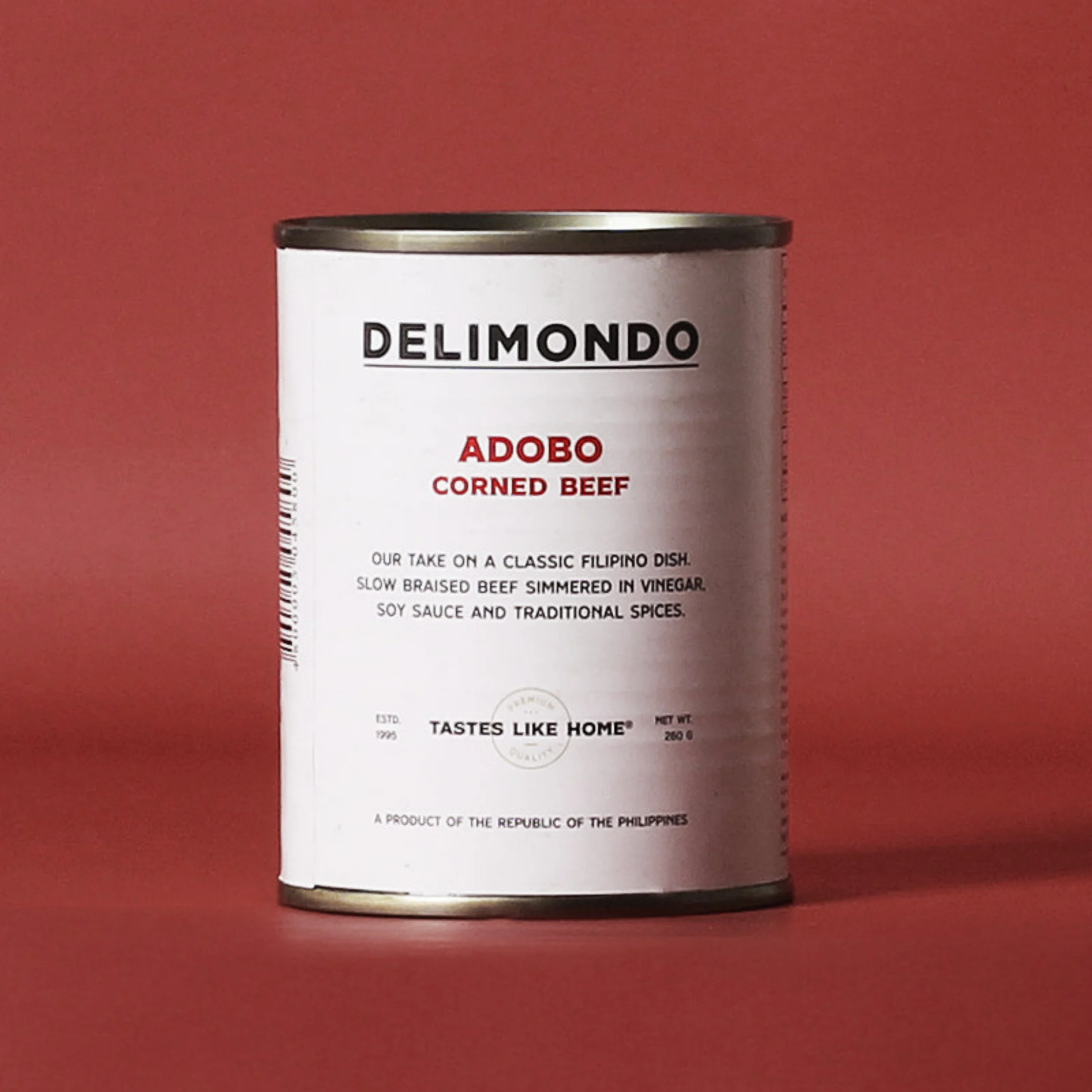 can of corned beef with a white label with a red background