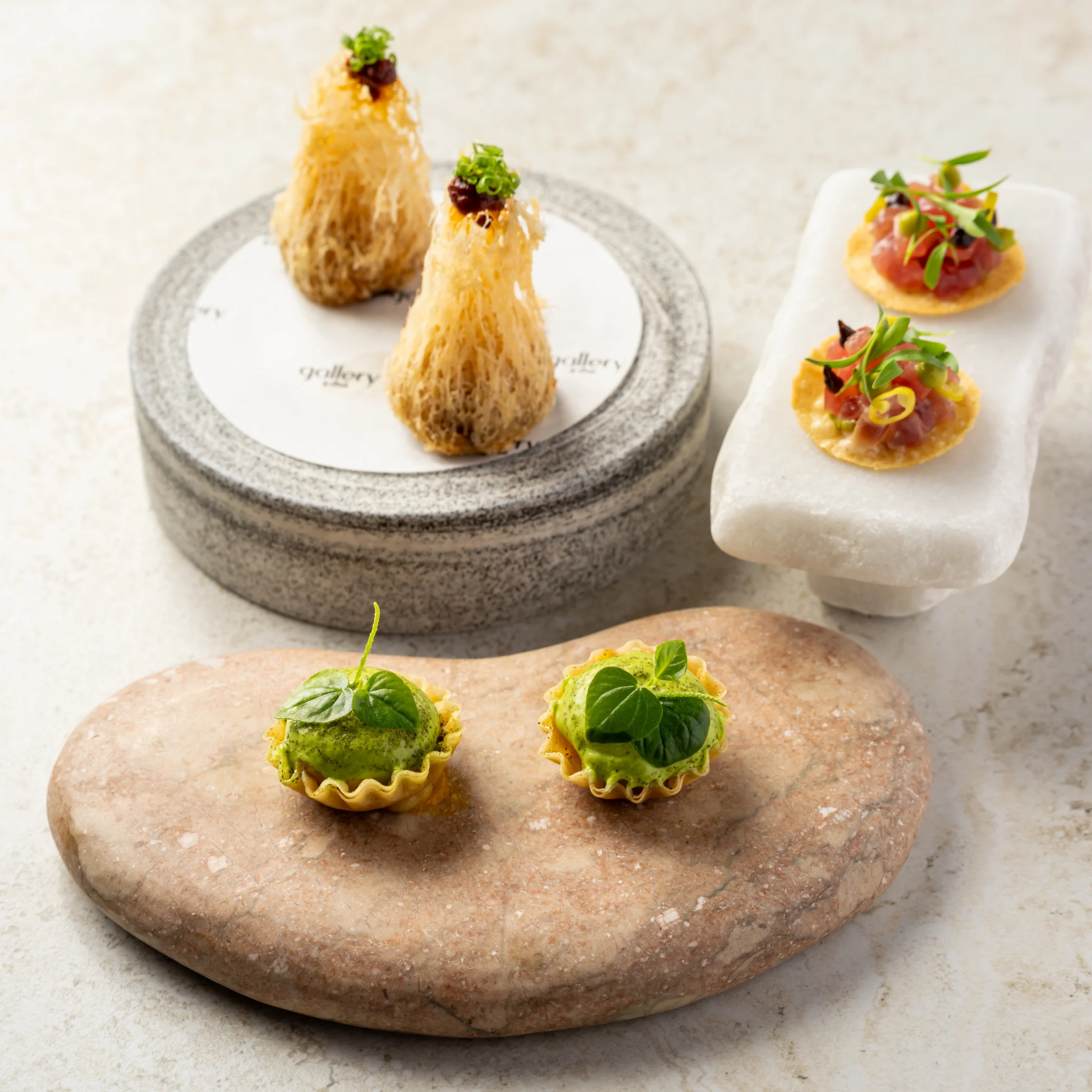 Scallop Tartlet, Chili Lobster Puff, and Tuna Tostada [PHOTO COURTESY OF Gallery by Chele]