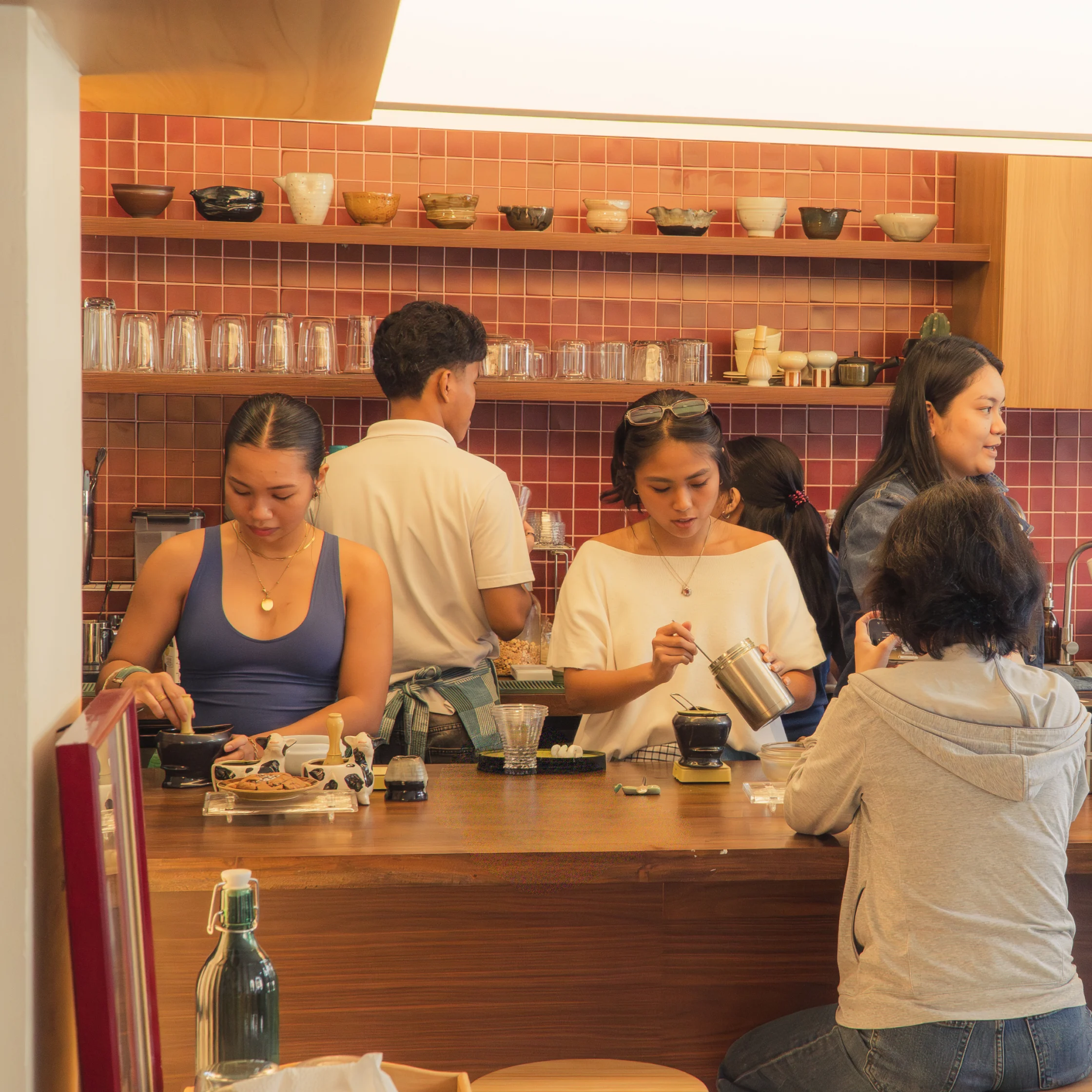 MATCHA SLOWBAR TAKE FIVE KAPITOLYO BARISTAS BEHIND THE COUNTER