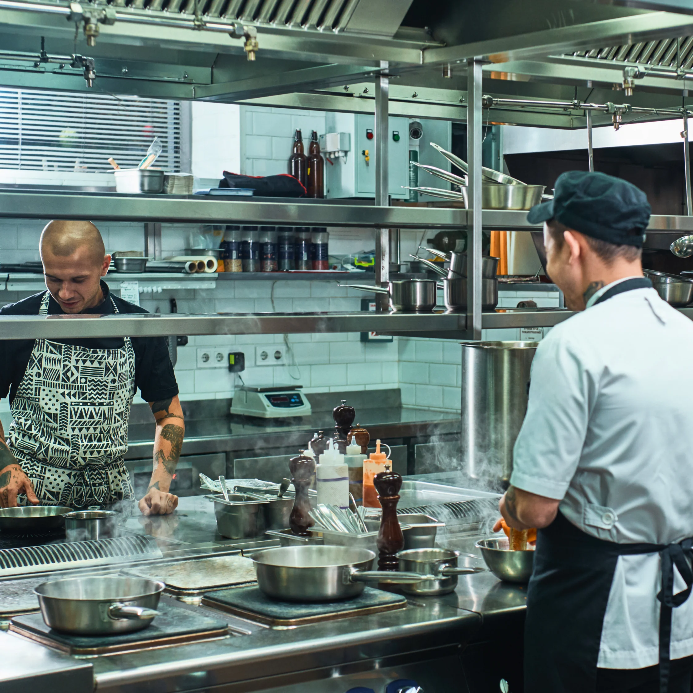 chefs in kitchen working